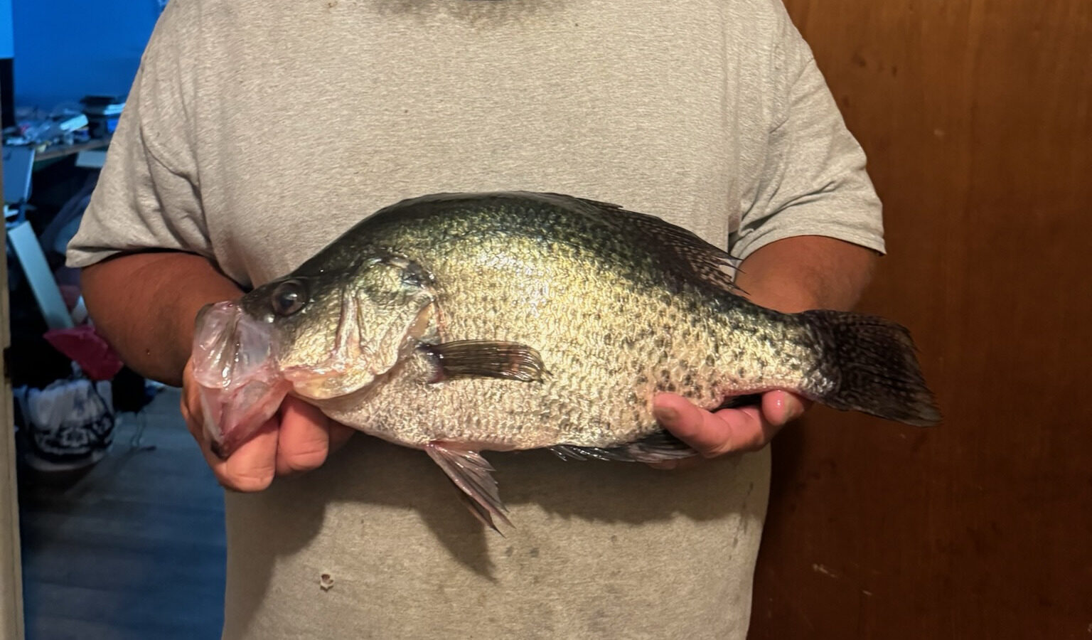 Big slab crappie from Oologah Lake held up in two hands